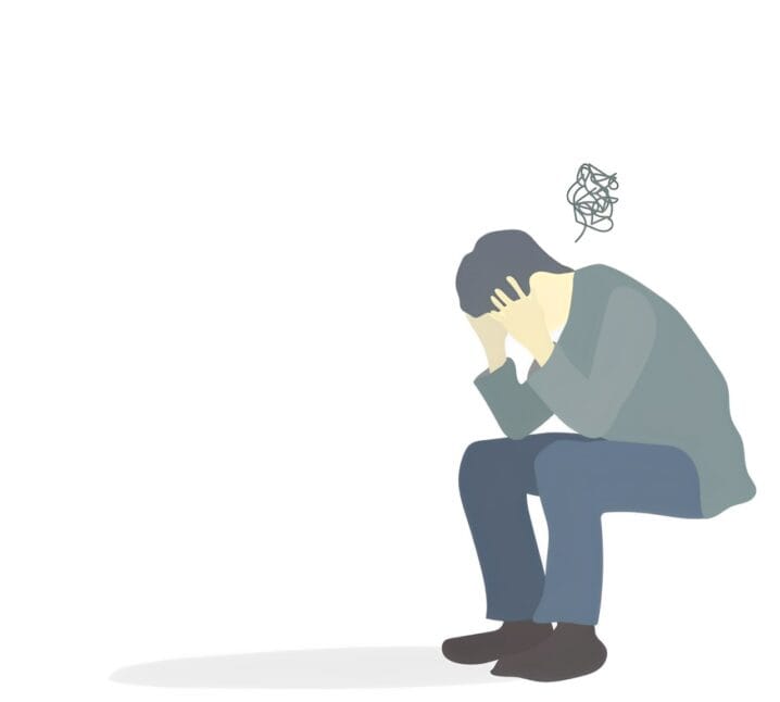 頭を抱えて悩む男性のイラスト